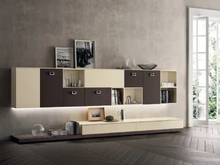 Parete Attrezzata Living Exclusiva in laccato Beige e Pelle Ebano di Scavolini