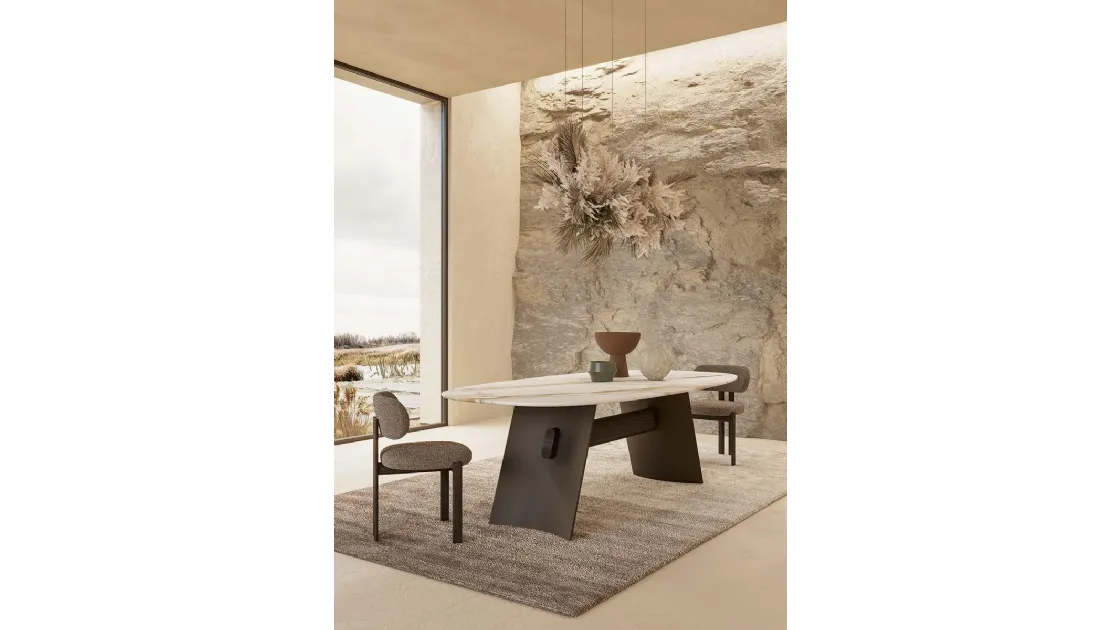 Tavolo con piano in marmo e struttura in metallo finitura bronzo Wave Nature Design